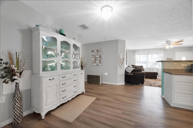 332 Smallwood Ave, Fort Pierce, FL 34982 - interior space featuring visible vents, a textured ceiling, ceiling fan, and wood finished floors