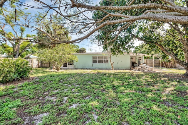 332 Smallwood Ave, Fort Pierce, FL 34982 - view of yard featuring a patio area and a fenced backyard