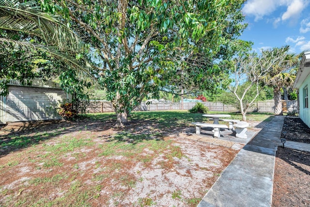 332 Smallwood Ave, Fort Pierce, FL 34982 - view of yard featuring a patio and a fenced backyard