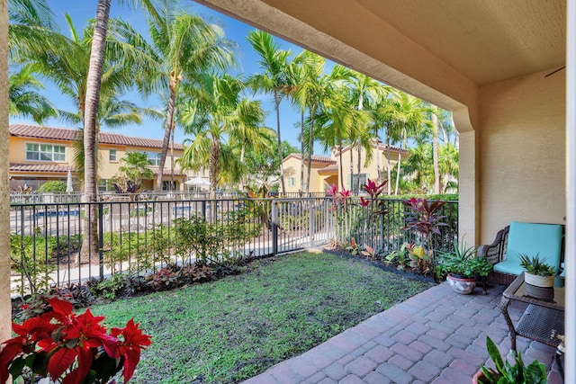 view of yard featuring a residential view and fence