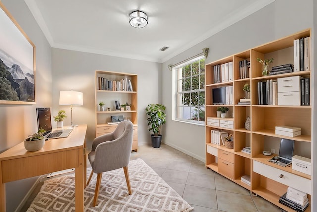 home office with crown molding, visible vents, baseboards, and light tile patterned floors