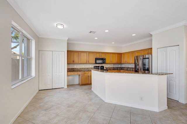 kitchen with light tile patterned floors, stainless steel fridge with ice dispenser, an island with sink, black microwave, and visible vents