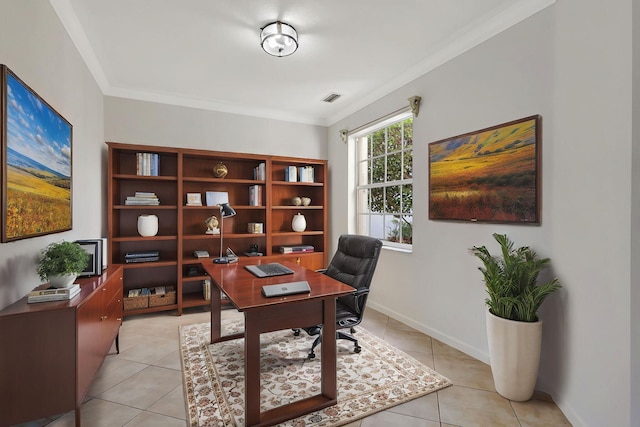 home office with crown molding, light tile patterned floors, baseboards, and visible vents