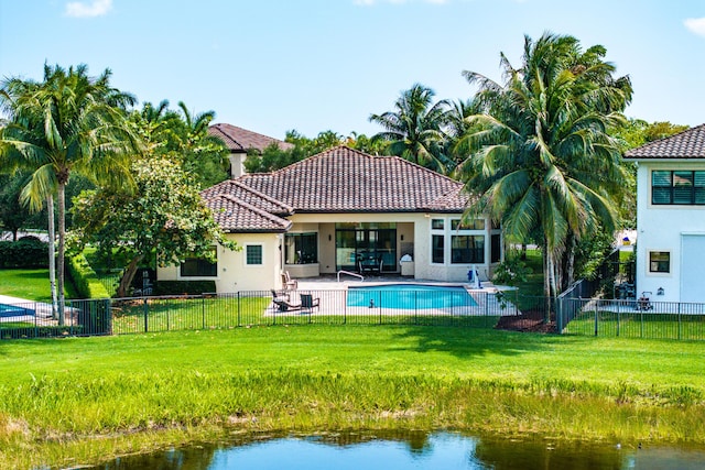16865 Charles River Dr, Delray Beach, FL 33446 - back of property with stucco siding, a tile roof, and a patio area