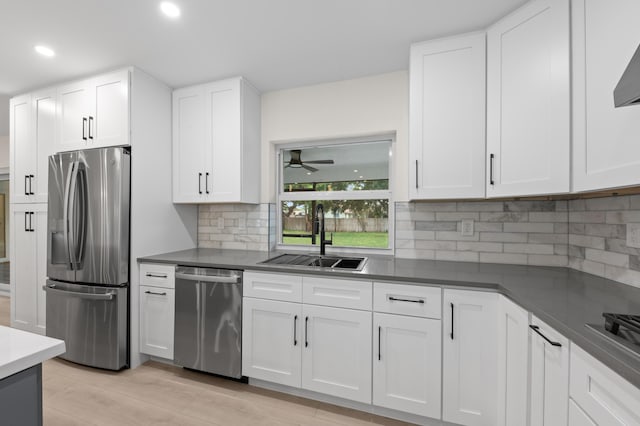 280 Sulky Way, Wellington, FL 33414 - kitchen featuring a sink, a ceiling fan, white cabinetry, and stainless steel appliances
