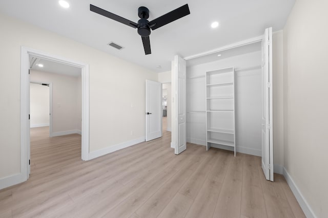 280 Sulky Way, Wellington, FL 33414 - unfurnished bedroom with recessed lighting, light wood-style floors, visible vents, and baseboards