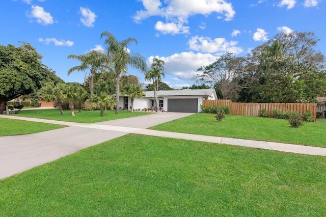 280 Sulky Way, Wellington, FL 33414 - single story home featuring fence, concrete driveway, a front yard, stucco siding, and a garage
