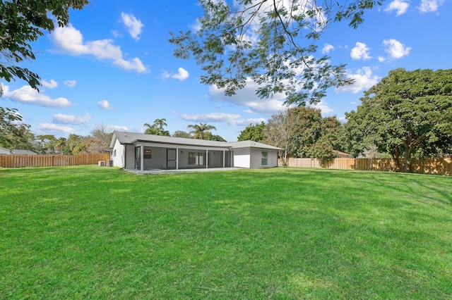 280 Sulky Way, Wellington, FL 33414 - view of yard featuring a fenced backyard and a sunroom