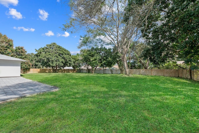 280 Sulky Way, Wellington, FL 33414 - view of yard featuring a patio area and a fenced backyard