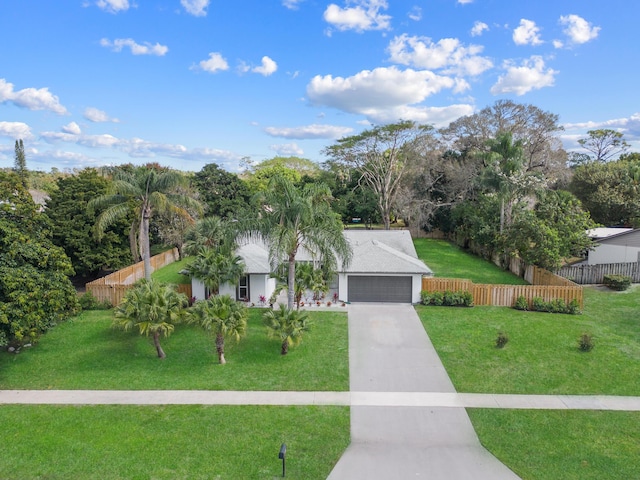 280 Sulky Way, Wellington, FL 33414 - view of front facade featuring an attached garage, concrete driveway, a front yard, and fence