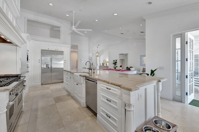 15082 Tall Oak Ave, Delray Beach, FL 33446 - kitchen featuring white cabinetry, custom range hood, high end appliances, and a ceiling fan