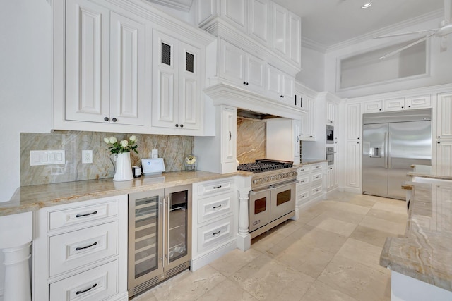 15082 Tall Oak Ave, Delray Beach, FL 33446 - kitchen featuring white cabinets, high quality appliances, wine cooler, and crown molding