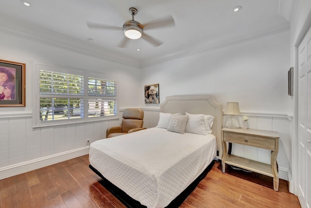 15082 Tall Oak Ave, Delray Beach, FL 33446 - bedroom with a ceiling fan, a wainscoted wall, ornamental molding, and wood finished floors