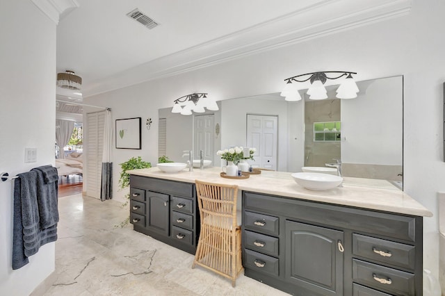15082 Tall Oak Ave, Delray Beach, FL 33446 - ensuite bathroom with double vanity, visible vents, ornamental molding, and a sink