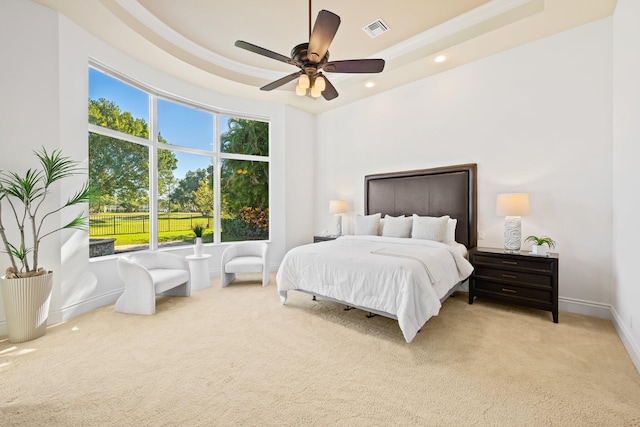 2885 Banyan Boulevard Cir NW, Boca Raton, FL 33431 - bedroom featuring a tray ceiling, baseboards, visible vents, recessed lighting, and light colored carpet