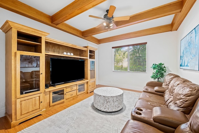 2885 Banyan Boulevard Cir NW, Boca Raton, FL 33431 - living room with beamed ceiling, light wood-style flooring, a ceiling fan, and baseboards