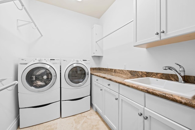 2885 Banyan Boulevard Cir NW, Boca Raton, FL 33431 - washroom with cabinet space, washing machine and dryer, and a sink