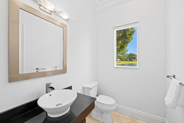 2885 Banyan Boulevard Cir NW, Boca Raton, FL 33431 - half bath featuring toilet, ornamental molding, and vanity