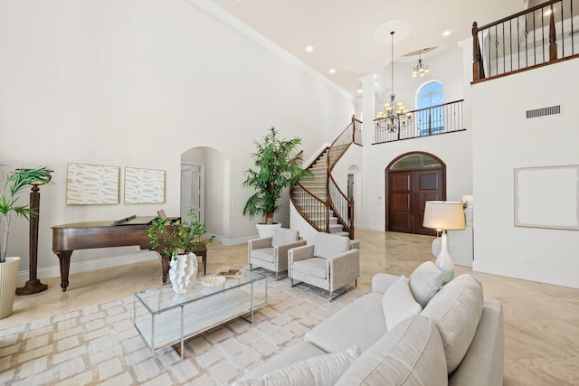 2885 Banyan Boulevard Cir NW, Boca Raton, FL 33431 - living area featuring stairway, a towering ceiling, visible vents, ornamental molding, and arched walkways