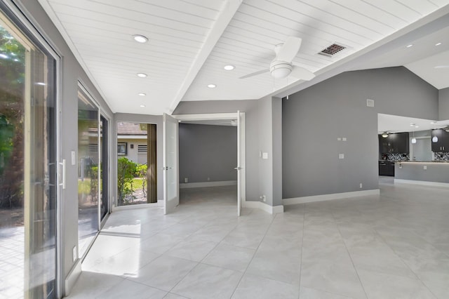 empty room with vaulted ceiling, recessed lighting, baseboards, ceiling fan, and visible vents