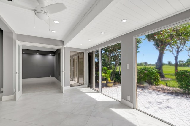 empty room featuring a ceiling fan, light tile patterned flooring, baseboards, and recessed lighting