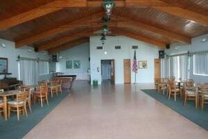 dining space with wooden ceiling and vaulted ceiling with beams