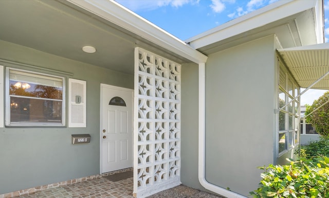 727 High Point Blvd N Unit D, Delray Beach, FL 33445 - doorway to property with stucco siding