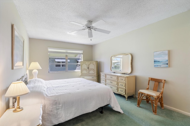 727 High Point Blvd N Unit D, Delray Beach, FL 33445 - bedroom with light carpet, baseboards, a textured ceiling, and a ceiling fan