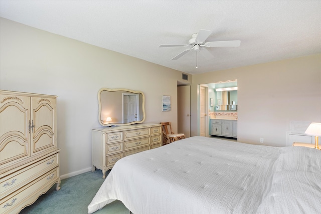 727 High Point Blvd N Unit D, Delray Beach, FL 33445 - bedroom featuring visible vents, light carpet, a ceiling fan, ensuite bathroom, and baseboards