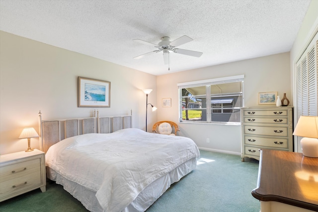 727 High Point Blvd N Unit D, Delray Beach, FL 33445 - carpeted bedroom with a closet, ceiling fan, a textured ceiling, and baseboards