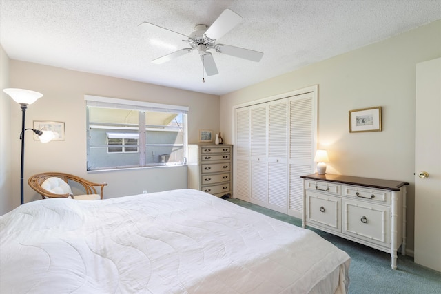 727 High Point Blvd N Unit D, Delray Beach, FL 33445 - bedroom featuring ceiling fan, carpet, a closet, and a textured ceiling