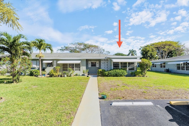 727 High Point Blvd N Unit D, Delray Beach, FL 33445 - ranch-style house with stucco siding, uncovered parking, and a front yard