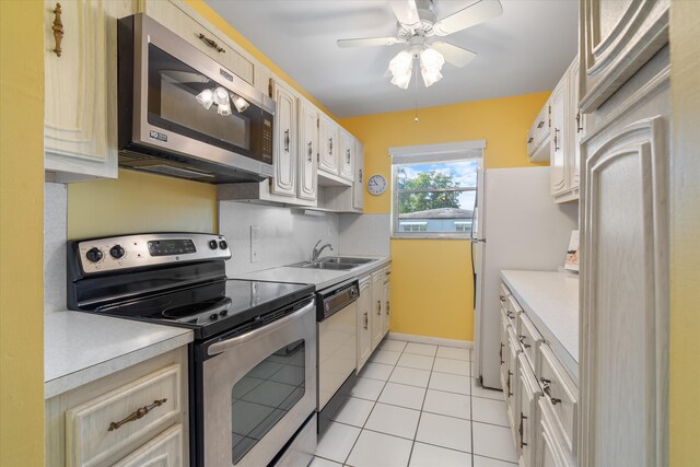 727 High Point Blvd N Unit D, Delray Beach, FL 33445 - kitchen with a sink, stainless steel appliances, decorative backsplash, and light countertops