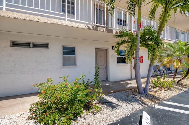 2601 NE 3rd Ct Unit 105, Boynton Beach, FL 33435 - entrance to property with stucco siding