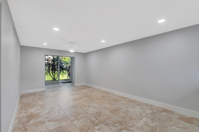 2601 NE 3rd Ct Unit 105, Boynton Beach, FL 33435 - spare room with a ceiling fan, recessed lighting, and baseboards
