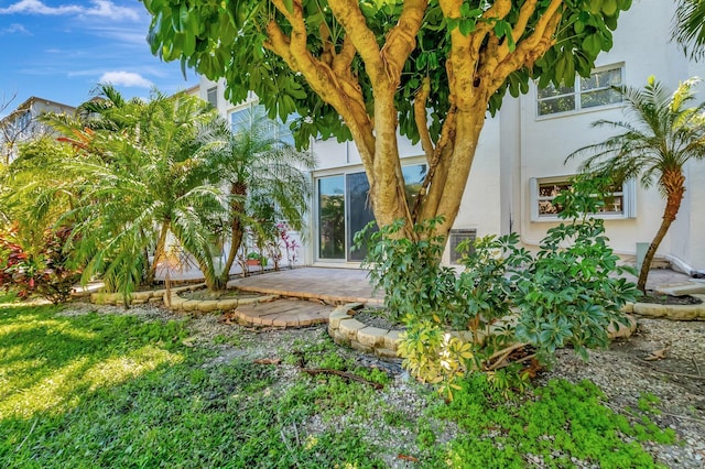 2601 NE 3rd Ct Unit 105, Boynton Beach, FL 33435 - view of front of house featuring stucco siding and a patio area