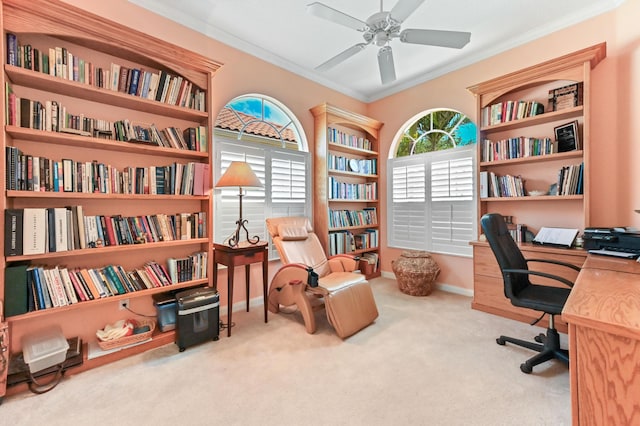 8378 Xanthus Ln, Wellington, FL 33414 - carpeted home office with ornamental molding, ceiling fan, bookshelves, and baseboards