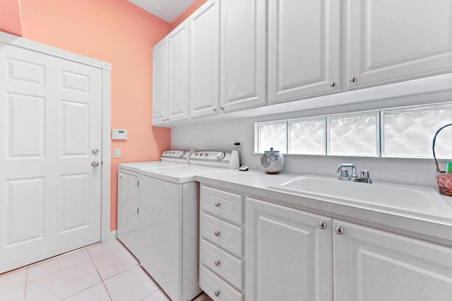 8378 Xanthus Ln, Wellington, FL 33414 - laundry room featuring cabinet space, separate washer and dryer, and light tile patterned floors