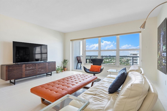 living room with tile patterned flooring