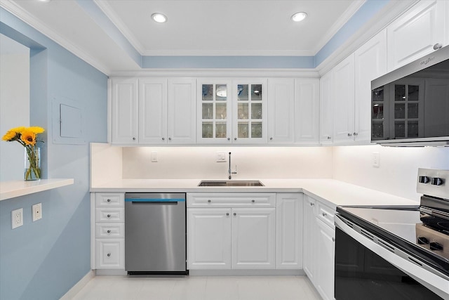3750 Galt Ocean Dr Unit 2008, Fort Lauderdale, FL 33308 - kitchen featuring appliances with stainless steel finishes, a sink, white cabinets, glass insert cabinets, and recessed lighting