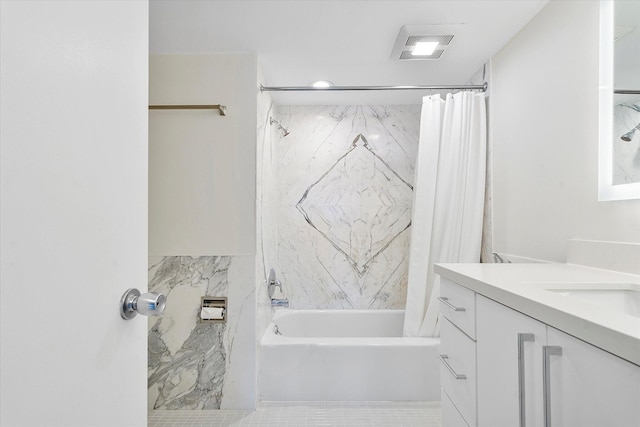 bathroom with visible vents, shower / tub combo with curtain, and vanity