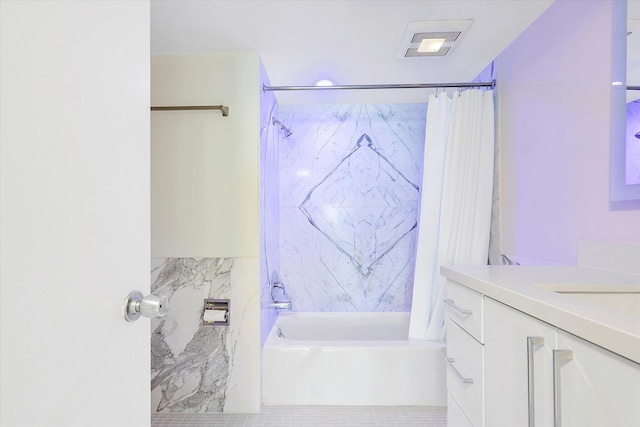 full bath featuring visible vents, shower / tub combo, and vanity