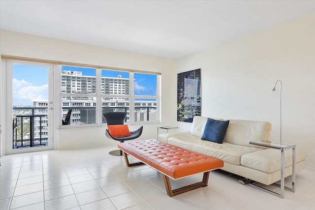 living area featuring a view of city and tile patterned floors
