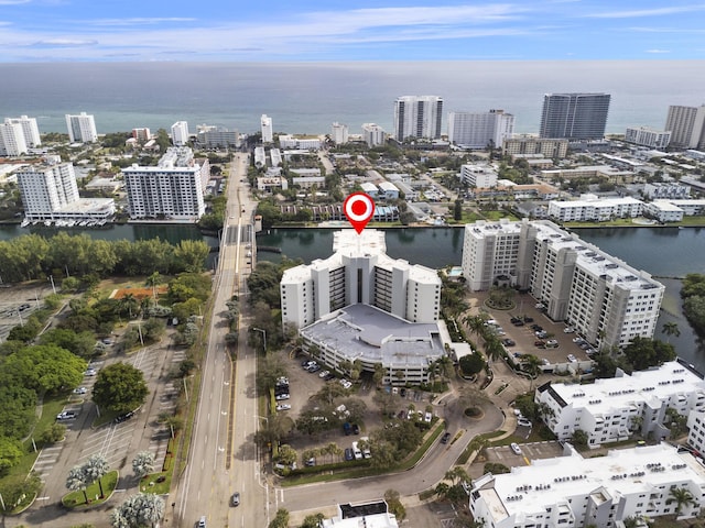 bird's eye view featuring a view of city and a water view