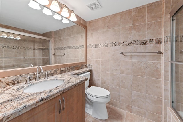 4734 Lucerne Lakes Blvd E Unit 302, Lake Worth, FL 33467 - full bath with tile walls, vanity, tiled shower, and toilet