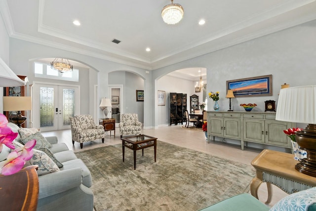 9129 SW Pepoli Way, Port Saint Lucie, FL 34987 - living area with a chandelier, arched walkways, recessed lighting, light tile patterned floors, and crown molding