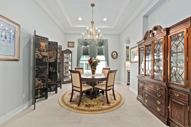 9129 SW Pepoli Way, Port Saint Lucie, FL 34987 - dining room with arched walkways, a chandelier, light tile patterned floors, recessed lighting, and baseboards