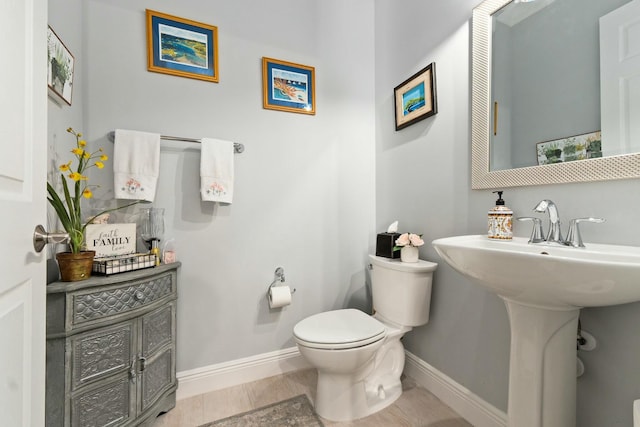 9129 SW Pepoli Way, Port Saint Lucie, FL 34987 - half bath with baseboards, toilet, and a sink