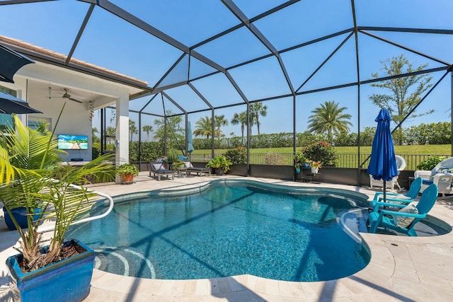 9129 SW Pepoli Way, Port Saint Lucie, FL 34987 - view of swimming pool with a patio, a ceiling fan, glass enclosure, and fence