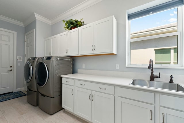 9129 SW Pepoli Way, Port Saint Lucie, FL 34987 - laundry room featuring separate washer and dryer, cabinet space, and ornamental molding